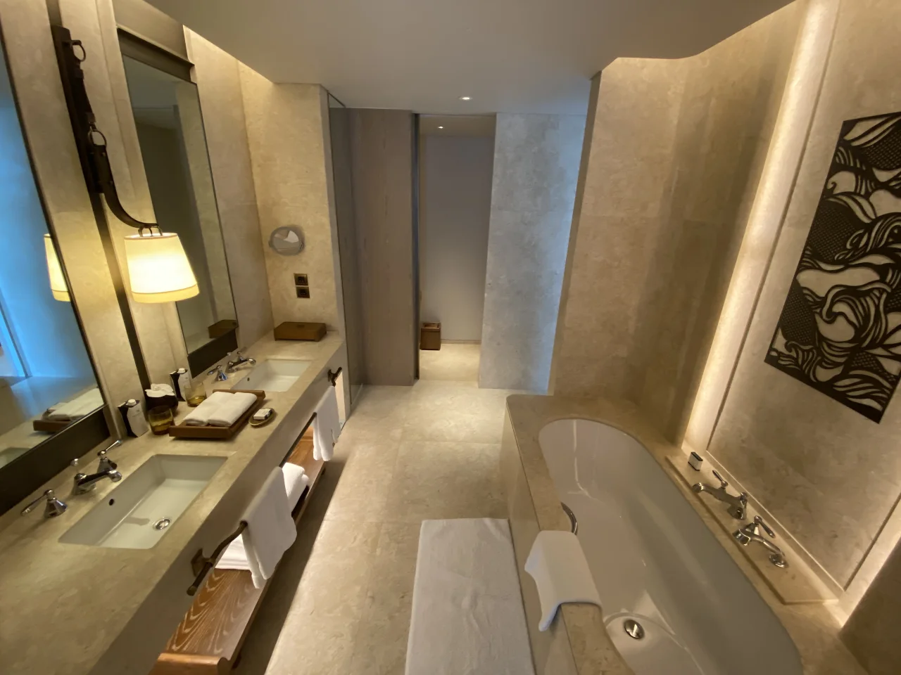 Bathroom with a soaking tub and twin sinks at Waldorf Astoria Bangkok